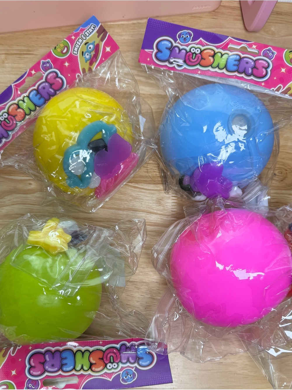 4 Smushers Kids Toy Squeeze Ball - Bright Pink, Blue, Yellow, Green